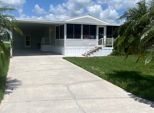 Fully Wrapped Mobile Home For Sale in Maple Corner Mobile Home Park, Labelle